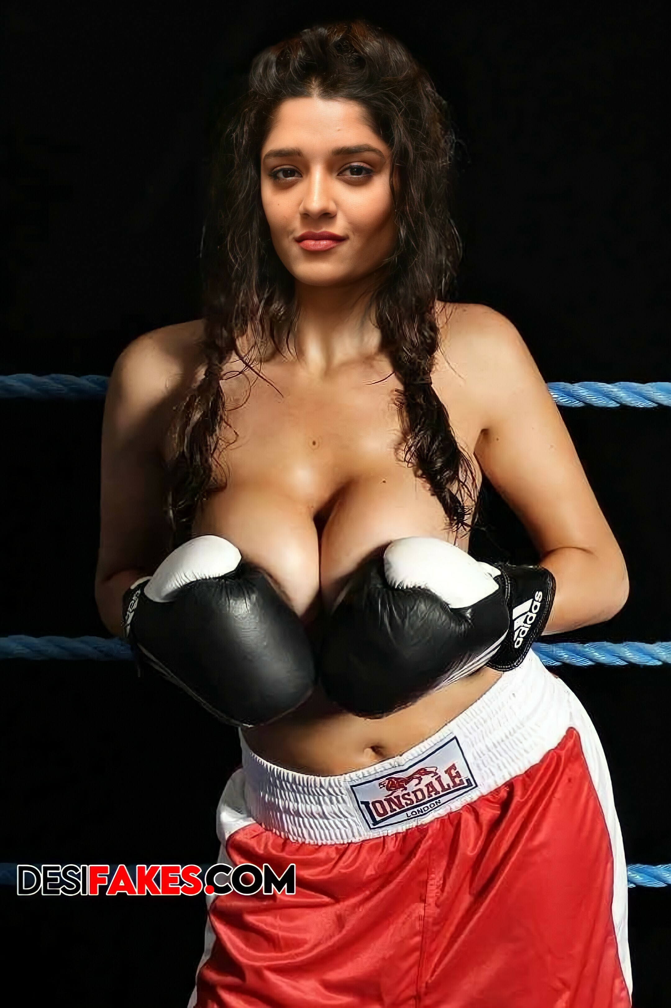 Ritika Singh squeezing her boobs
